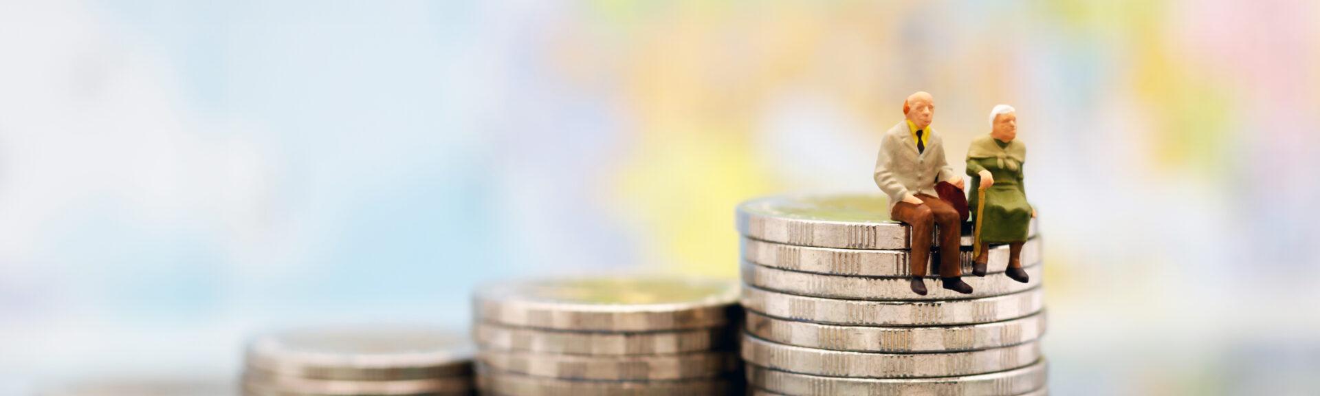 Miniature people: Happy senior couple sitting on coins stack, money saving growth. Retirement, emergency plan and Financial Concept.