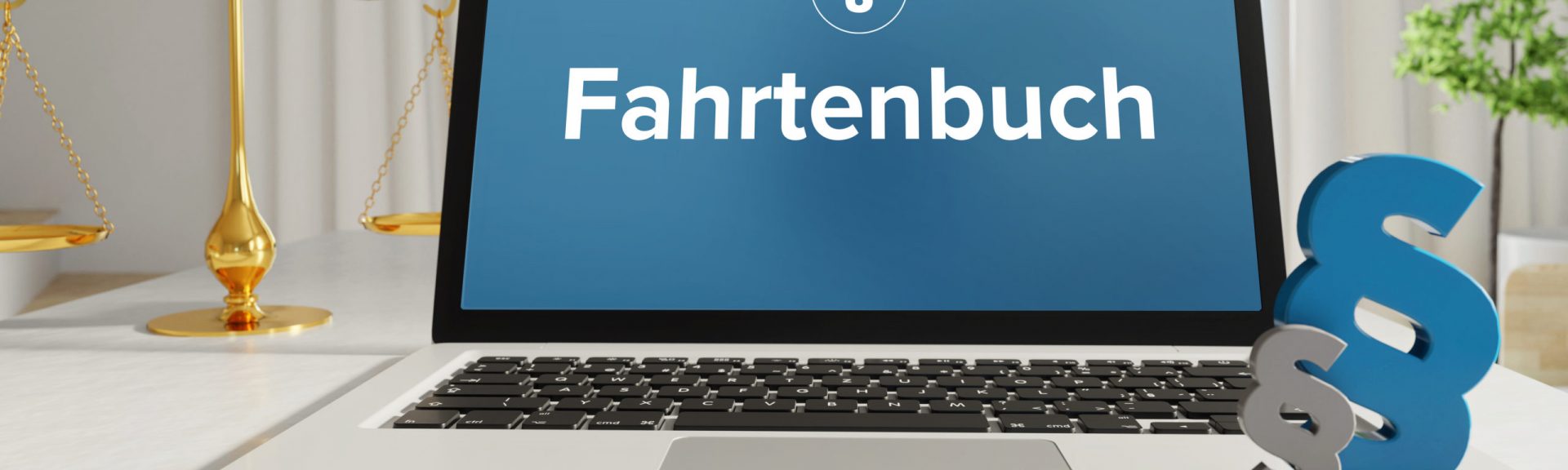Fahrtenbuch – Recht, Gesetz, Internet. Laptop im Büro mit Begriff auf dem Monitor. Paragraf und Waage.