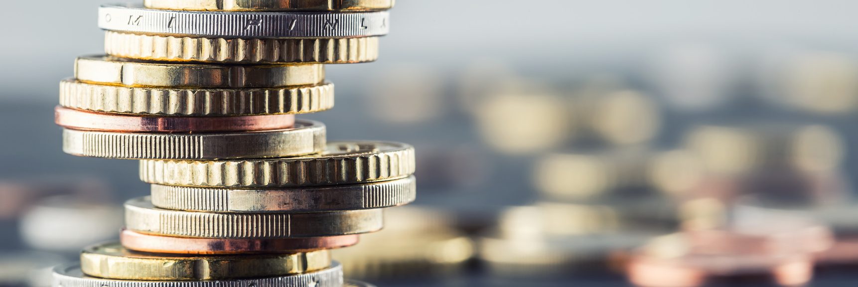 Euro coins. Euro money. Euro currency.Coins stacked on each other in different positions. Money concept.
