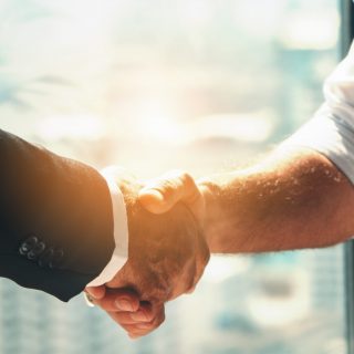 business background of businessman having handshake