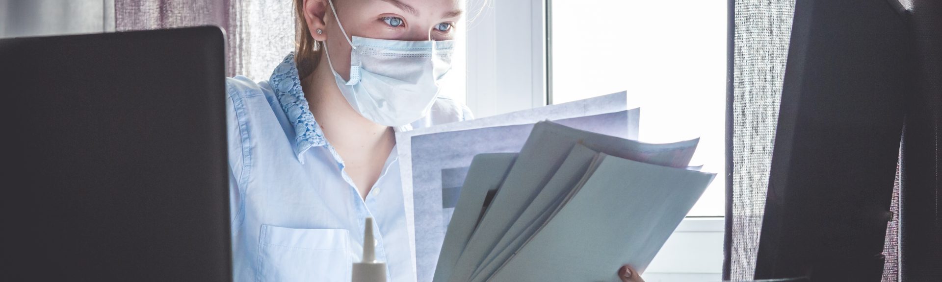 Coronavirus. Quarantine. Online training education and freelance work. Computer, laptop and girl studying remotely. Coronavirus pandemic in the world. Closing schools
