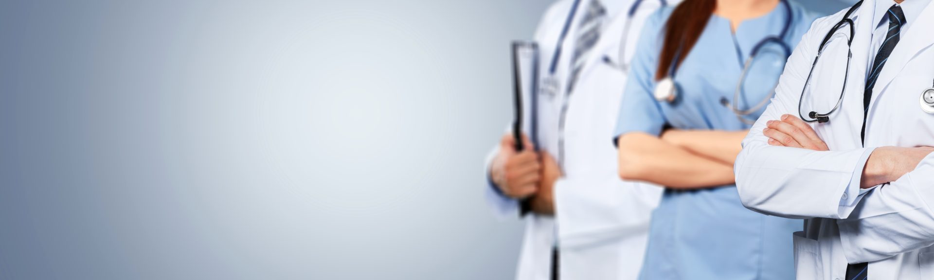 Three doctors on the right with space on the left side