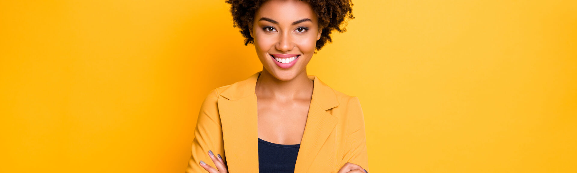 Portrait of her she nice attractive lovely charming cute cheerful cheery, content wavy-haired girl folded arms isolated over bright vivid shine vibrant yellow color background