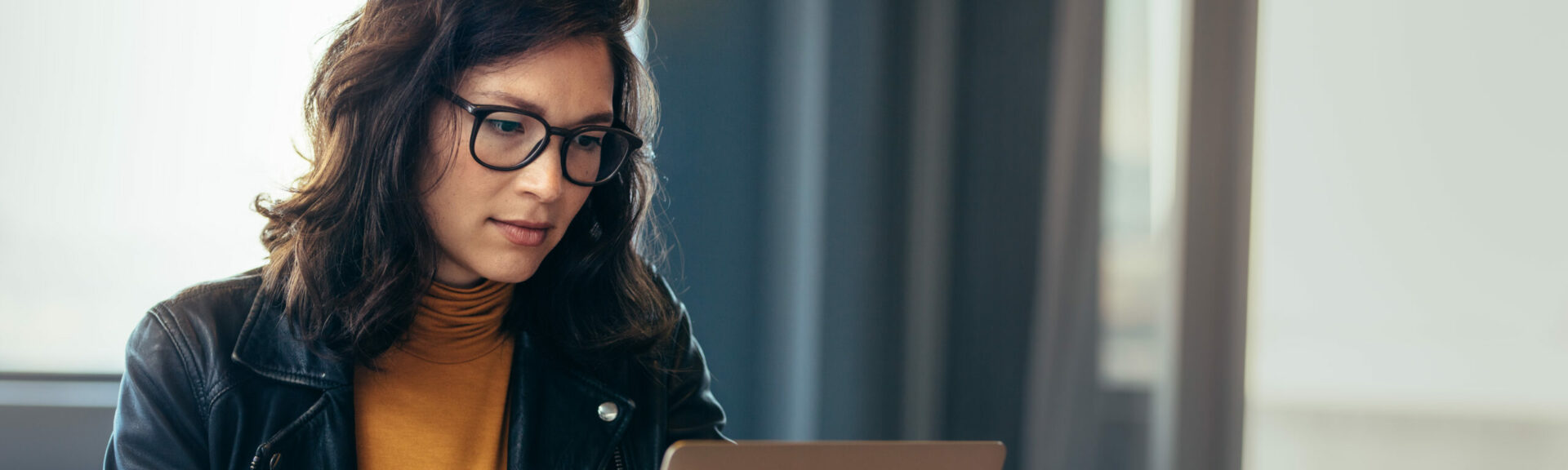 Asian woman working laptop at office