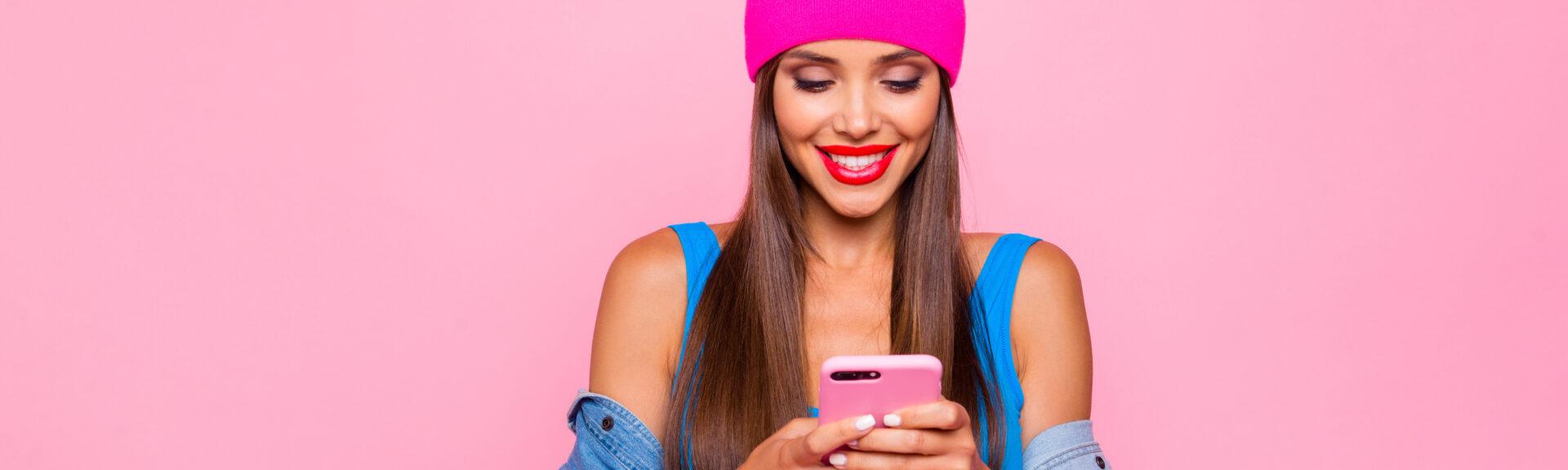 I want like on instagram! Crazy subscriber addicted people person concept. Close up photo portrait of attractive funny cheerful toothy lady using holding cellular in hand isolated bright background