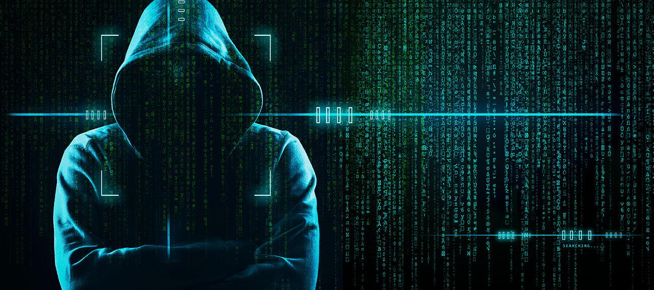Cybersecurity. Guy with hoodie-symbol for an intruder