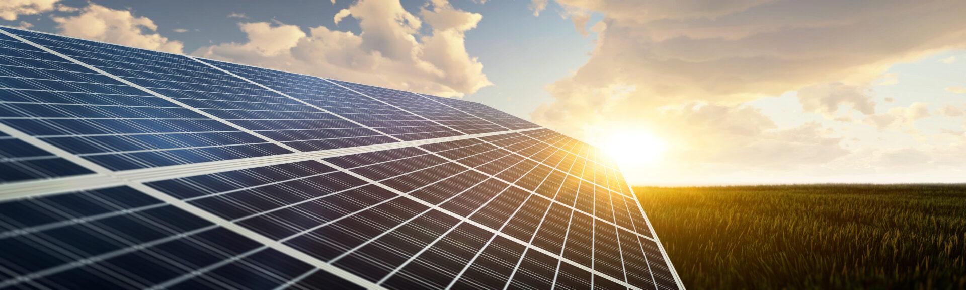 panoramic - solar panel at sunset