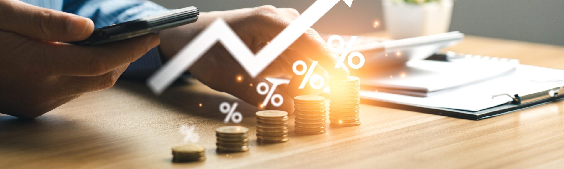 Interest rate and dividend concept, Businessman is calculating income and return on investment in percentage. income, return, retirement, compensation fund, investment, dividend tax, stock market